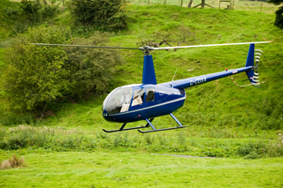 Weddings - Helicopter taking off with bride and groom abroad